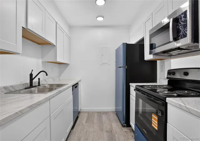 Listing Photo 5 - Condo for sale in building located at 14226 E 1st Dr, Aurora, CO 80011 - Unit #C03
