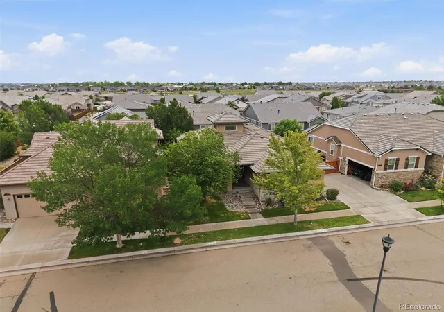 Photo 3 of Single family home for sale at 11402 Chambers Dr, Commerce City, CO 80022 | MLS# 4121029 | Listing updated on 2026-09-11