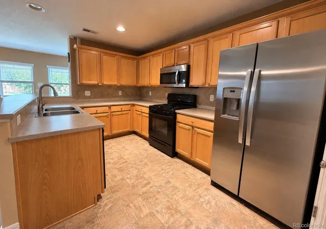 Photo 1 of Condo for sale at 9797 Mayfair St #F, Englewood, CO 80112 | MLS# 3804628 | Listing updated on 2026-09-11