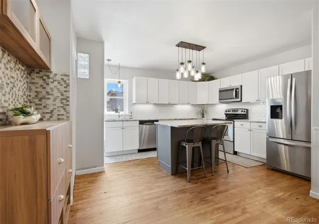 Photo 2 of Townhouse for sale at 722 E 18th Avenue, Denver, CO 80203 | MLS# 9217214 | Listing updated on 2026-10-07