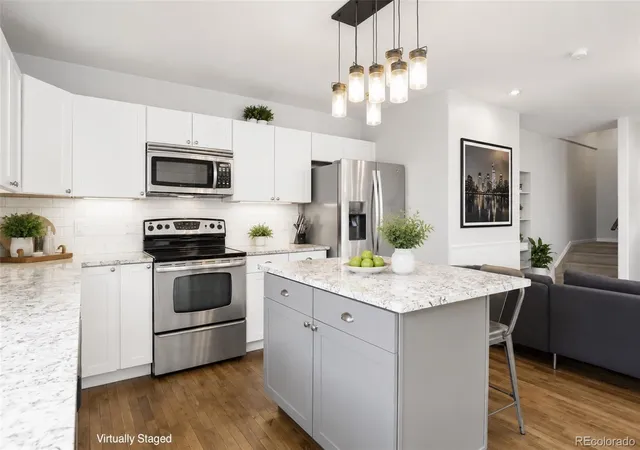 Photo 3 of Townhouse for sale at 722 E 18th Avenue, Denver, CO 80203 | MLS# 9217214 | Listing updated on 2026-10-07