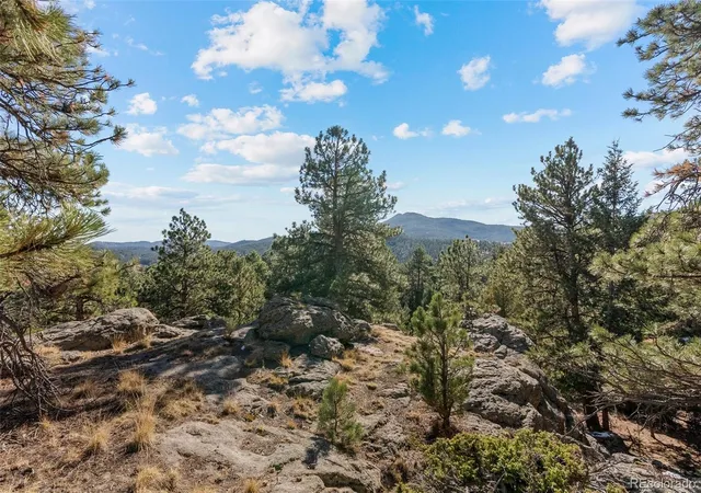 Photo 4 of Single family home for sale at 7153 Silverhorn Dr, Evergreen, CO 80439 | MLS# 5362056 | Listing updated on 2026-09-22