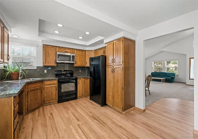 Photo 3 of Single family home for sale at 9146 W Quarto Pl, Littleton, CO 80128 | MLS# 2121277 | Listing updated on 2026-09-23