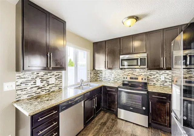 Photo 3 of Single family home for sale at 5559 Netherland St, Denver, CO 80249 | MLS# 2565794 | Listing updated on 2026-10-07