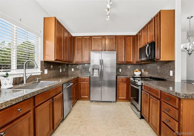 Photo 3 of Townhouse for sale at 12830 Jasmine St #A, Thornton, CO 80602 | MLS# 6856303 | Listing updated on 2026-10-02