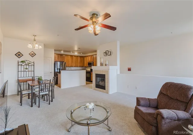 Listing Photo 5 - Condo for sale in building located at 7130 Simms St, Arvada, CO 80004 - Unit #202