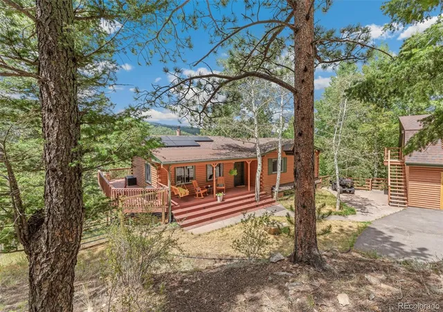 Photo 2 of Single family home for sale at 24333 Bent Feather Rd, Conifer, CO 80433 | MLS# 2467053 | Listing updated on 2026-09-15