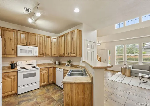Listing Photo 5 - Condo for sale in building located at 12704 Jasmine St, Thornton, CO 80602 - Unit #C