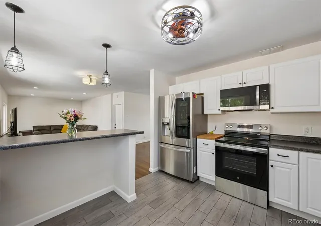 Photo 3 of Single family home for sale at 6017 Vivian Ct, Arvada, CO 80004 | MLS# 9792010 | Listing updated on 2026-09-11