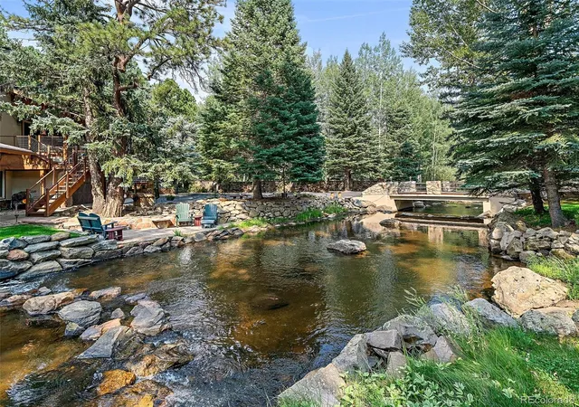 Photo 2 of Single family home for sale at 34393 Upper Bear Crk Rd, Evergreen, CO 80439 | MLS# 4114307 | Listing updated on 2026-10-26