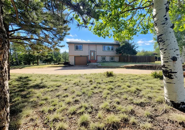 Photo 2 of Single family home for sale at 1056 Sundance Cir, Woodland Park, CO 80863 | MLS# 8561996 | Listing updated on 2026-09-28