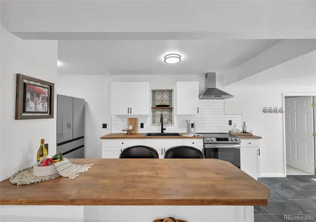 Photo 2 of Single family home for sale at 575 S Clay St, Denver, CO 80219 | MLS# 2273736 | Listing updated on 2026-10-21