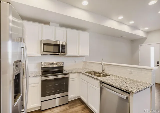 Photo 3 of Townhouse for sale at 6504 N Biscay St, Denver, CO 80249 | MLS# 7322933 | Listing updated on 2026-09-25