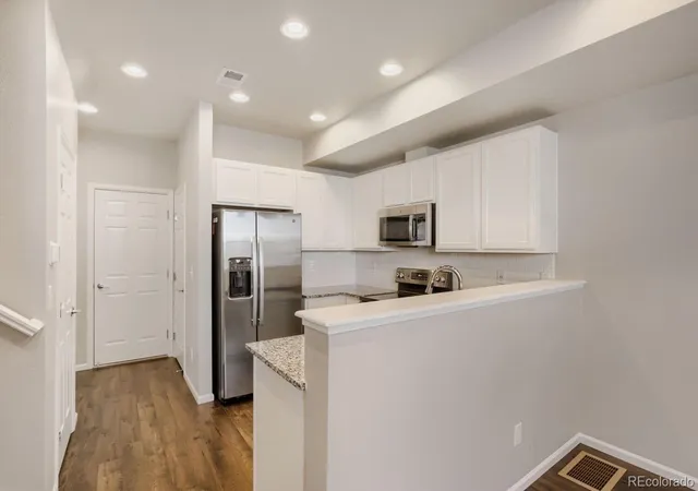 Photo 2 of Townhouse for sale at 6504 N Biscay St, Denver, CO 80249 | MLS# 7322933 | Listing updated on 2026-10-23