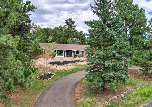 Photo 3 of Single family home for sale at 1350 Woodmoor Dr, Monument, CO 80132 | MLS# 2961615 | Listing updated on 2026-09-09