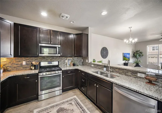 Photo 2 of Townhouse for sale at 1758 S Buchanan Cir, Aurora, CO 80018 | MLS# 1629195 | Listing updated on 2026-09-11