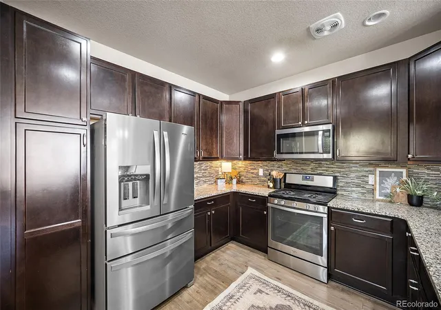 Photo 3 of Townhouse for sale at 1758 S Buchanan Cir, Aurora, CO 80018 | MLS# 1629195 | Listing updated on 2026-09-11