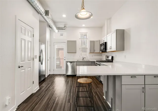 Photo 1 of Townhouse for sale at 7709 E 28th Place, Denver, CO 80238 | MLS# 3914088 | Listing updated on 2026-09-11