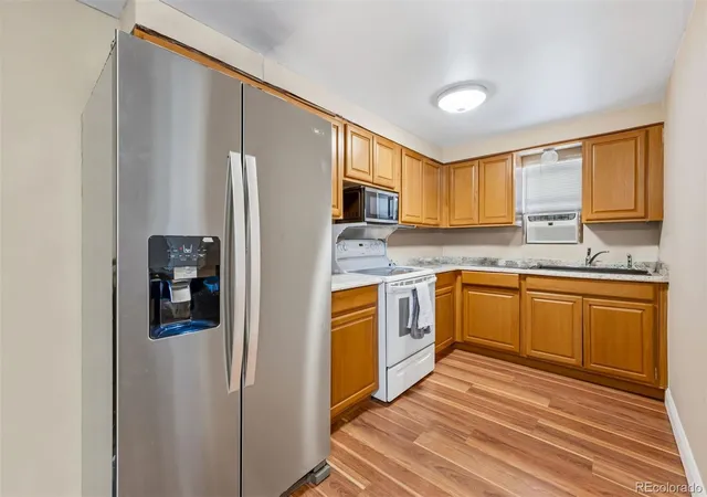 Listing Photo 5 - Condo for sale in building located at 801 Denver Ave, Fort Lupton, CO 80621
