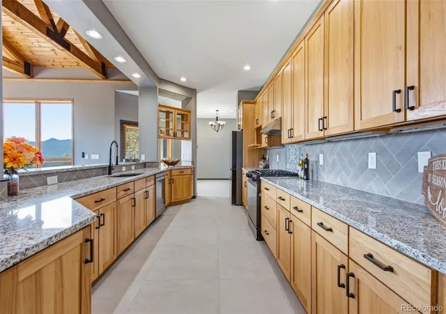 Photo 4 of Single family home for sale at 15441 W Sampson Rd, Littleton, CO 80127 | MLS# 5851268 | Listing updated on 2026-10-11