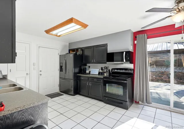 Photo 3 of Single family home for sale at 1736 S Olathe St, Aurora, CO 80017 | MLS# 4798062 | Listing updated on 2026-10-26