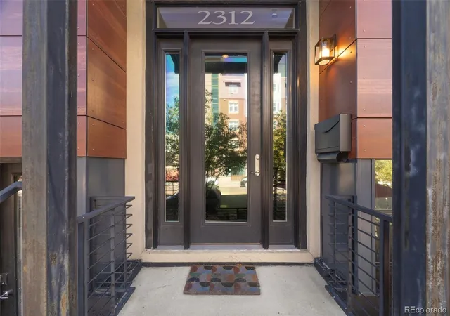Photo 3 of Townhouse for sale at 2312 Curtis St, Denver, CO 80205 | MLS# 8442375 | Listing updated on 2026-09-10