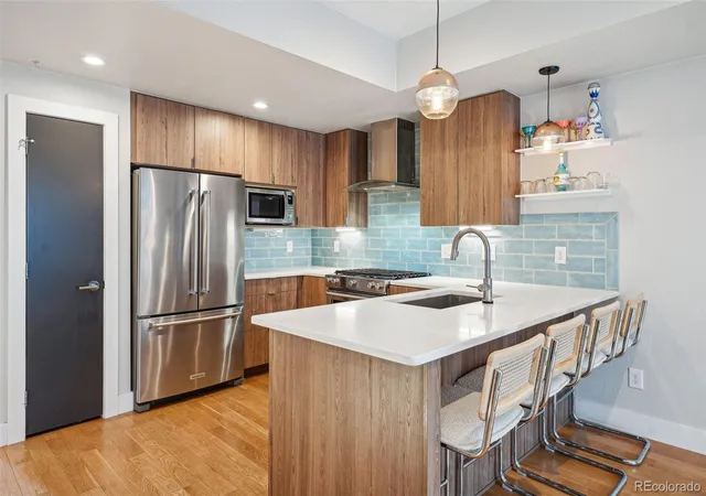 Photo 3 of Townhouse for sale at 4911 Lowell Blvd #102, Denver, CO 80221 | MLS# 2667319 | Listing updated on 2026-09-13