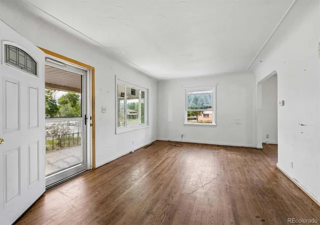 Photo 3 of Single family home for sale at 1996 Lima St, Aurora, CO 80010 | MLS# 2095720 | Listing updated on 2026-10-21