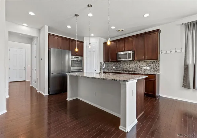 Photo 2 of Single family home for sale at 14088 Garfield St, Thornton, CO 80602 | MLS# 2376904 | Listing updated on 2026-10-08