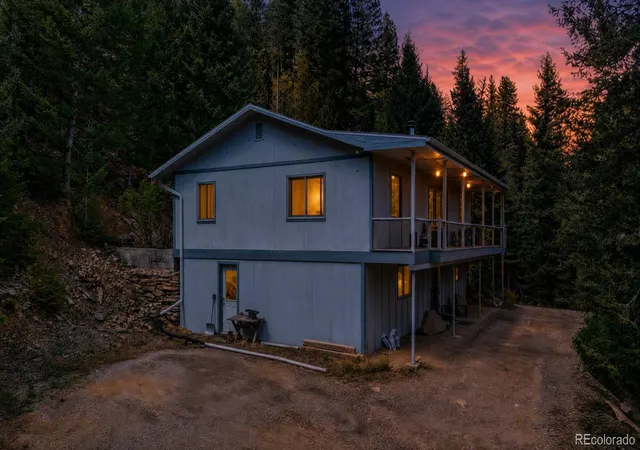 Photo 2 of Single family home for sale at 990 Saddleback Dr, Evergreen, CO 80439 | MLS# 8274076 | Listing updated on 2026-09-11
