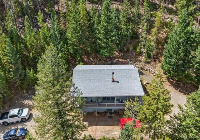 Photo 3 of Single family home for sale at 990 Saddleback Dr, Evergreen, CO 80439 | MLS# 8274076 | Listing updated on 2026-09-11