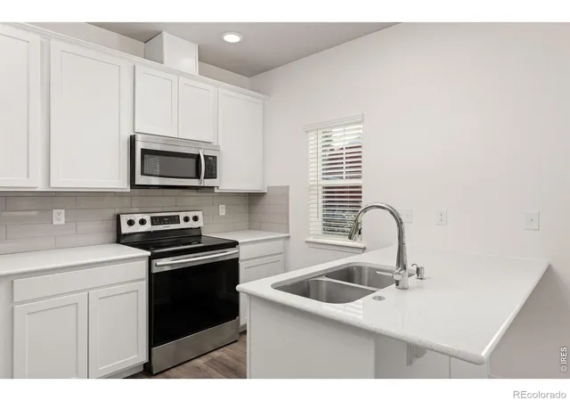 Photo 4 of Townhouse for sale at 135 S 8th Street, Berthoud, CO 80513 | MLS# IR1067965 | Listing updated on 2026-09-28