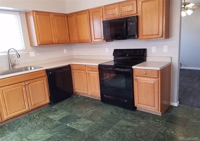 Listing Photo 5 - Condo for sale in building located at 6751 E 72nd Pl, Commerce, CO 80022 - Unit #I & J