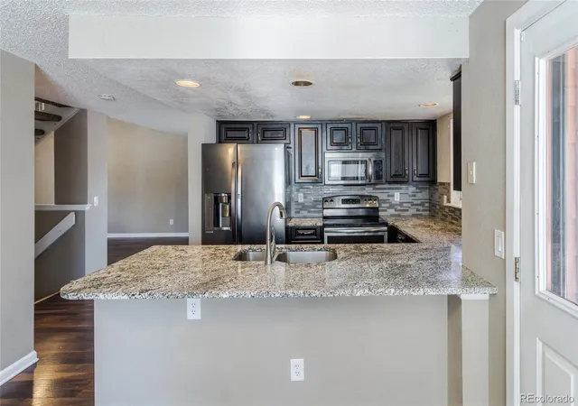 Photo 4 of Single family home for sale at 4984 S Dunkirk Way, Centennial, CO 80015 | MLS# 5828352 | Listing updated on 2026-09-15