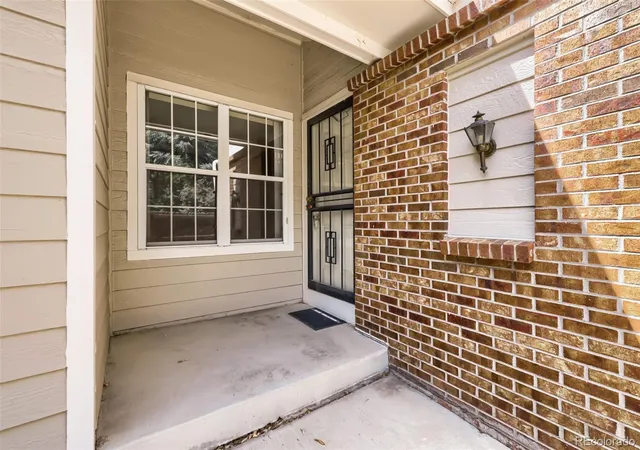 Photo 1 of Townhouse for sale at 1575 S Trenton Ct, Denver, CO 80231 | MLS# 4238734 | Listing updated on 2026-09-15