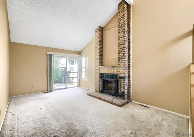 Photo 3 of Townhouse for sale at 1575 S Trenton Ct, Denver, CO 80231 | MLS# 4238734 | Listing updated on 2026-09-15