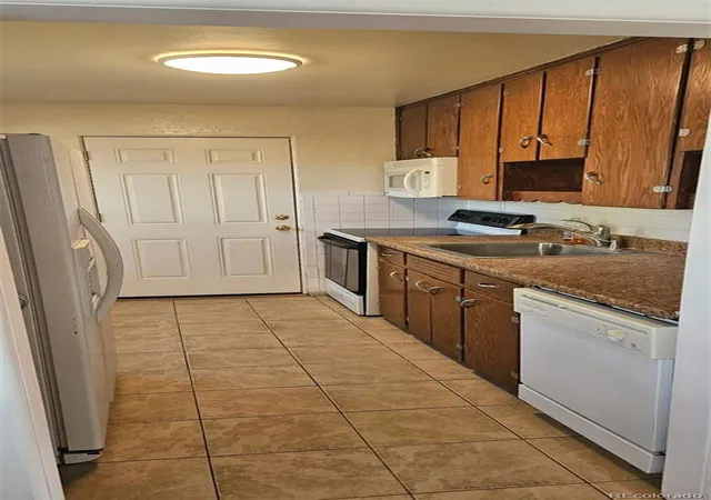 Photo 3 of Sale Pending at 1741 Macon St, Aurora, CO 80010 | MLS# 5208171 | Listing updated on 2026-10-01