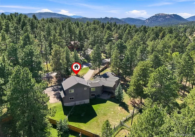Photo 2 of Single family home for sale at 28609 Pine Dr, Evergreen, CO 80439 | MLS# 9053379 | Listing updated on 2026-10-09