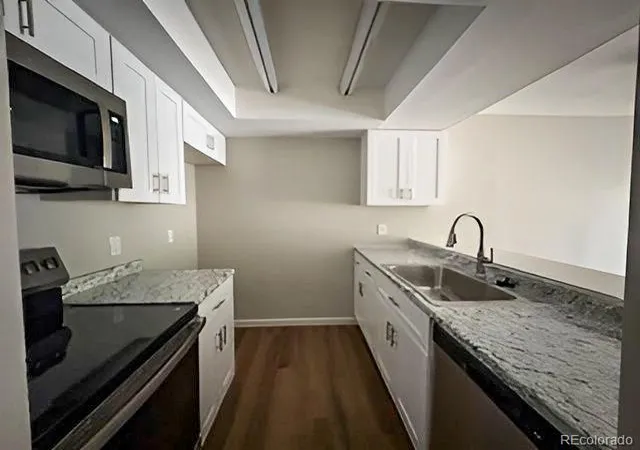 Listing Photo 4 - Condo for sale in building located at 16153 E Alaska Pl, Aurora, CO 80017 - Unit #1