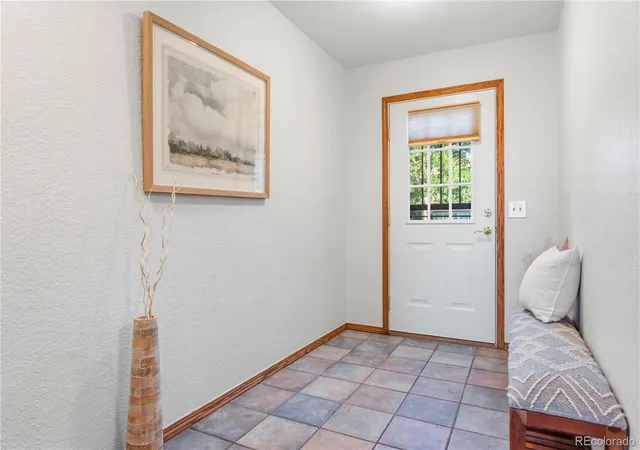Photo 2 of Townhouse for sale at 1811 S Quebec Way #57, Denver, CO 80231 | MLS# 5576931 | Listing updated on 2026-10-06