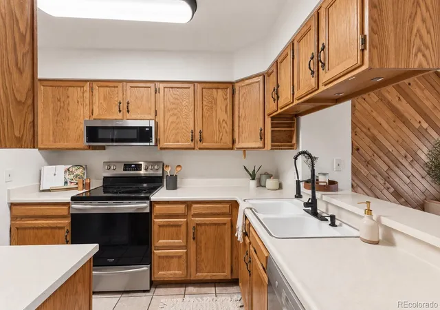 Photo 3 of Townhouse for sale at 1811 S Quebec Way #57, Denver, CO 80231 | MLS# 5576931 | Listing updated on 2026-10-06
