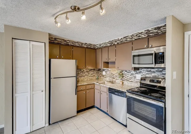 Photo 3 of Condo for sale at 1306 S Parker Rd #164, Denver, CO 80231 | MLS# 4688398 | Listing updated on 2026-10-03