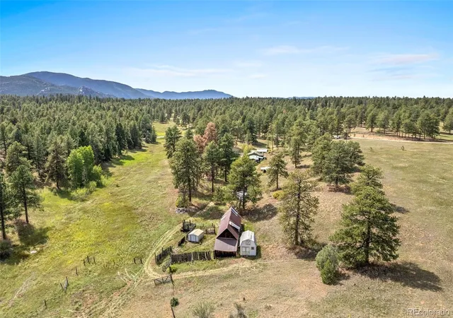 Photo 1 of Single family home for sale at 21555 Spring Crk Rd, Buffalo Creek, CO 80425 | MLS# 3829258 | Listing updated on 2026-09-22