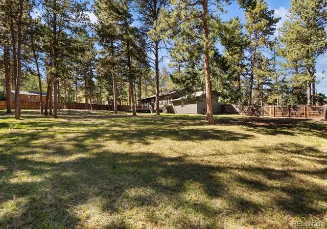 Photo 2 of Single family home for sale at 1005 W Lorraine Ave, Woodland Park, CO 80863 | MLS# 7563107 | Listing updated on 2026-09-22