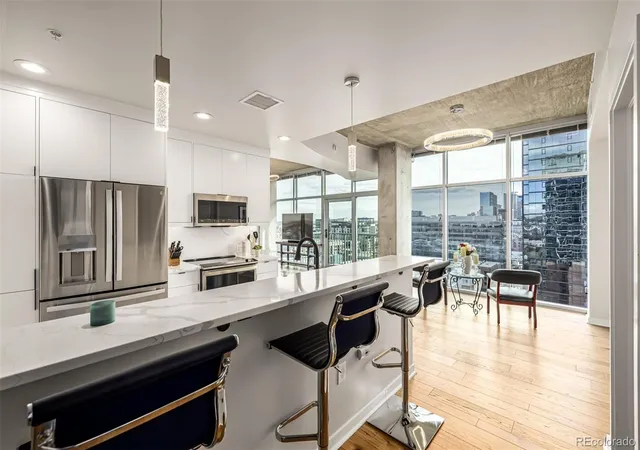 Photo 1 of Condo for sale at 1700 Bassett St #1412, Denver, CO 80202 | MLS# 5060435 | Listing updated on 2026-09-11