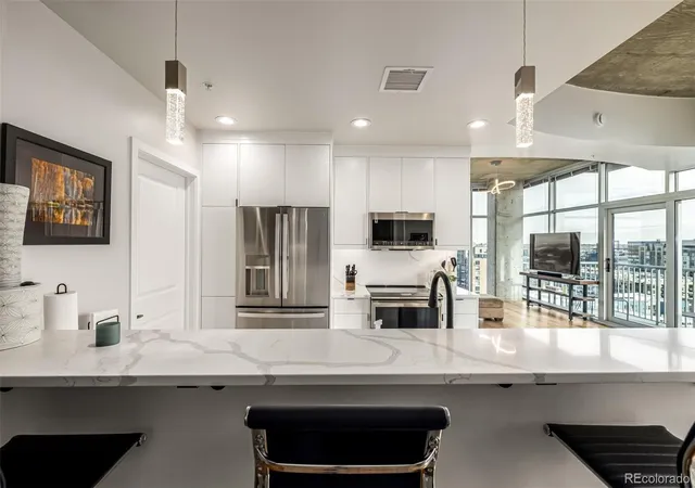 Photo 4 of Condo for sale at 1700 Bassett St #1412, Denver, CO 80202 | MLS# 5060435 | Listing updated on 2026-09-11