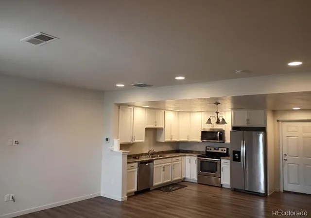 Photo 3 of Townhouse for sale at 5077 N Central Park Blvd #N, Denver, CO 80238 | MLS# 3060998 | Listing updated on 2026-10-05