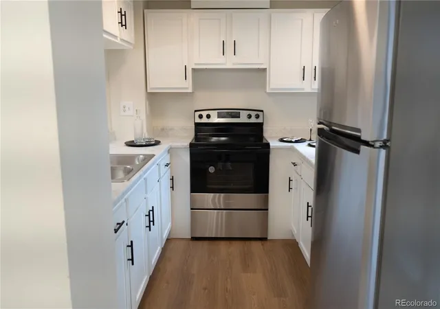 Listing Photo 3 - Condo for sale in building located at 3073 W Ctr Ave, Denver, CO 80219 - Unit #C