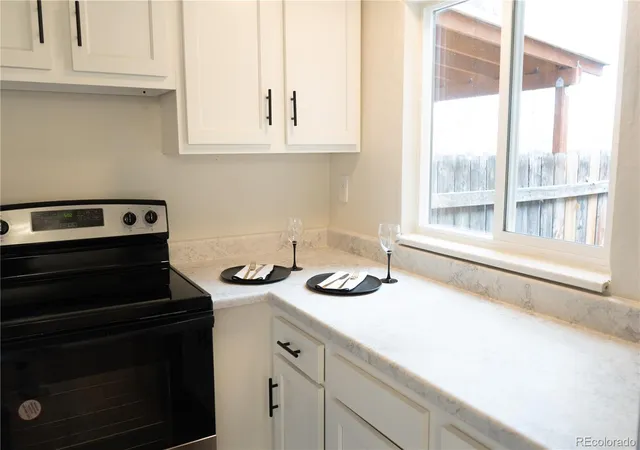 Listing Photo 5 - Condo for sale in building located at 3073 W Ctr Ave, Denver, CO 80219 - Unit #C