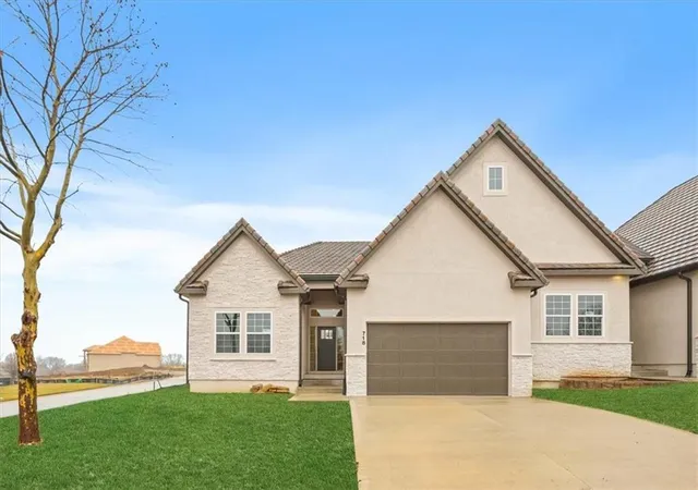 Photo 1 of Townhouse for sale at 718 Ne Algonquin St #A, Lees Summit, MO 64064 | MLS# 2584796 | Listing updated on 2026-09-13